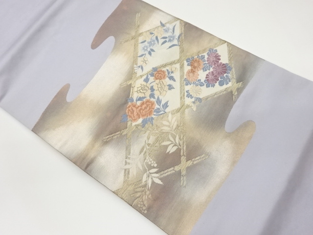 引箔襷に草花模様織出し名古屋帯